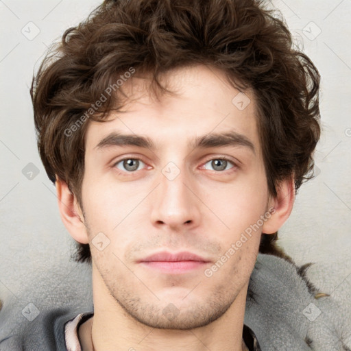 Neutral white young-adult male with short  brown hair and grey eyes