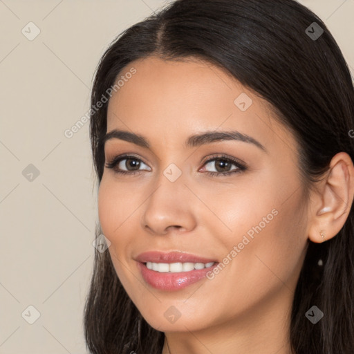 Joyful white young-adult female with long  brown hair and brown eyes