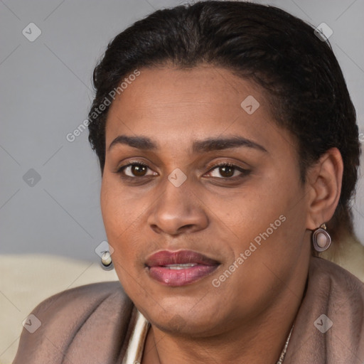 Joyful latino young-adult female with short  brown hair and brown eyes