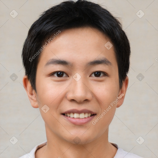 Joyful asian young-adult male with short  black hair and brown eyes