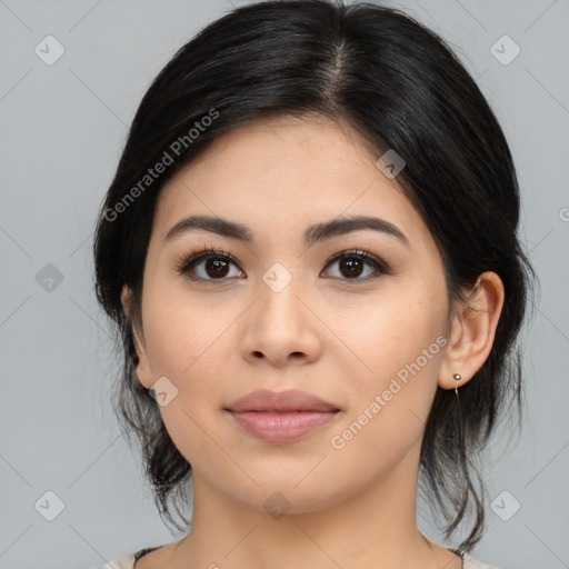 Joyful asian young-adult female with medium  black hair and brown eyes