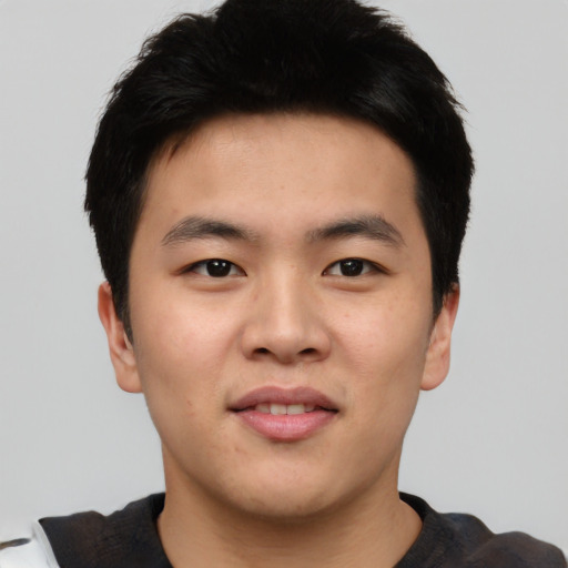 Neutral asian young-adult male with short  black hair and brown eyes