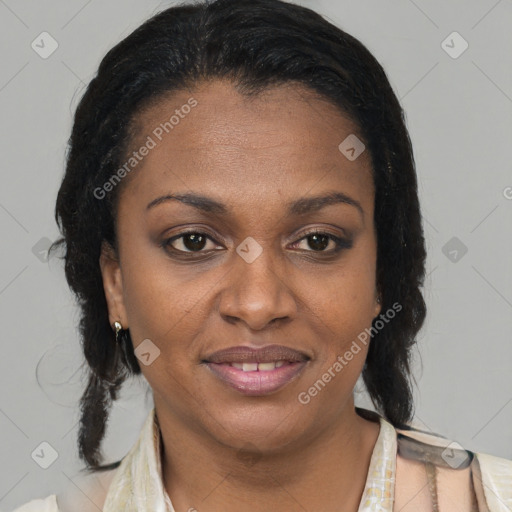 Joyful latino adult female with medium  brown hair and brown eyes