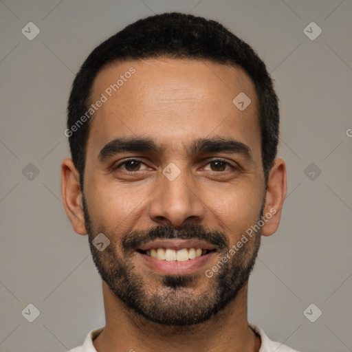 Joyful latino young-adult male with short  black hair and brown eyes