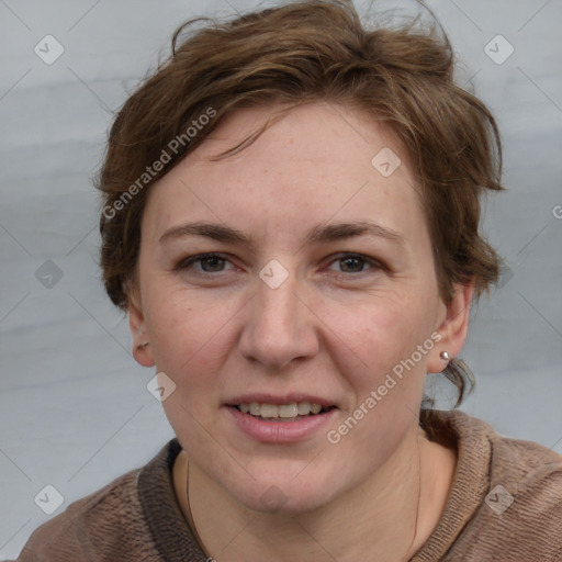 Joyful white adult female with medium  brown hair and grey eyes