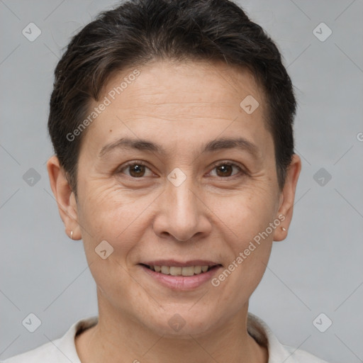 Joyful white adult female with short  brown hair and brown eyes