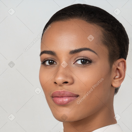 Joyful latino young-adult female with short  black hair and brown eyes