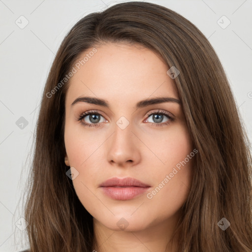 Neutral white young-adult female with long  brown hair and brown eyes