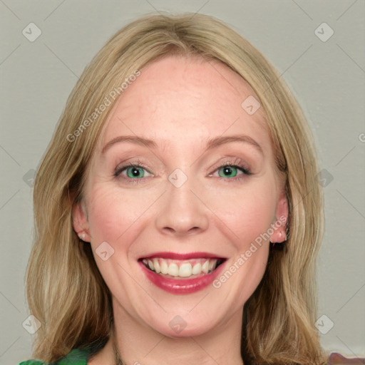 Joyful white young-adult female with long  brown hair and green eyes