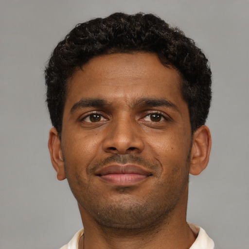 Neutral black young-adult male with short  brown hair and brown eyes