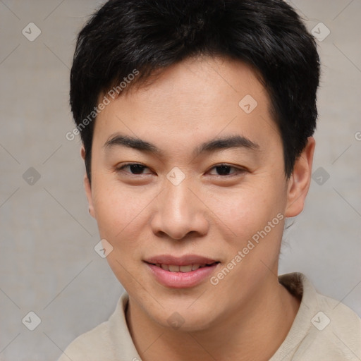 Joyful asian young-adult male with short  brown hair and brown eyes