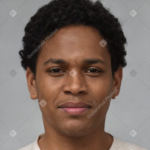 Joyful black young-adult male with short  brown hair and brown eyes