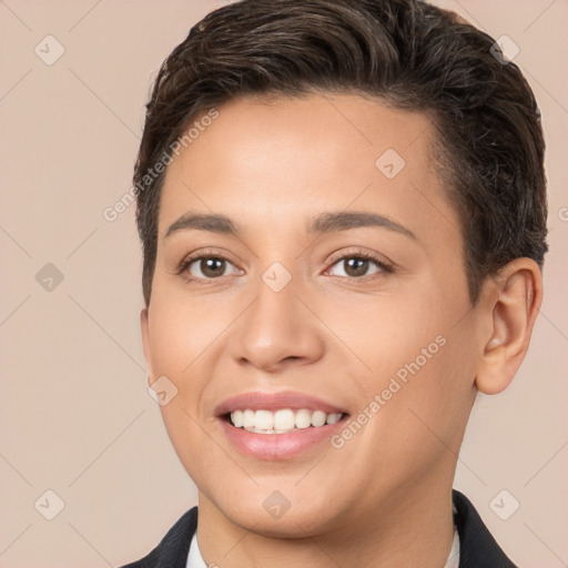 Joyful white young-adult female with short  brown hair and brown eyes