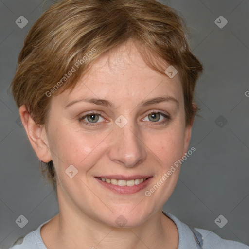 Joyful white young-adult female with short  brown hair and blue eyes