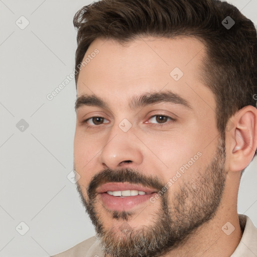 Joyful white young-adult male with short  brown hair and brown eyes