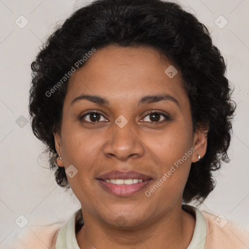 Joyful latino adult female with short  brown hair and brown eyes
