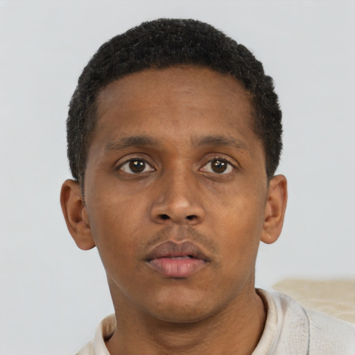 Neutral black young-adult male with short  brown hair and brown eyes
