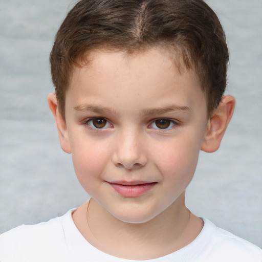 Joyful white child female with short  brown hair and brown eyes