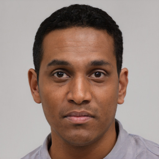 Neutral black young-adult male with short  black hair and brown eyes