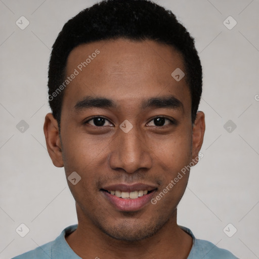 Joyful white young-adult male with short  black hair and brown eyes