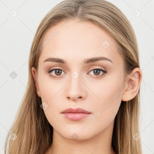 Neutral white young-adult female with long  brown hair and brown eyes