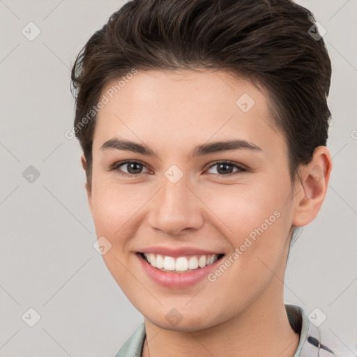 Joyful white young-adult female with short  brown hair and brown eyes