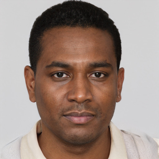 Neutral black young-adult male with short  brown hair and brown eyes