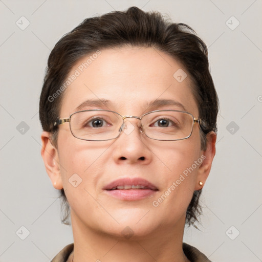 Joyful white adult female with short  brown hair and grey eyes