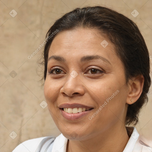 Joyful white adult female with medium  brown hair and brown eyes