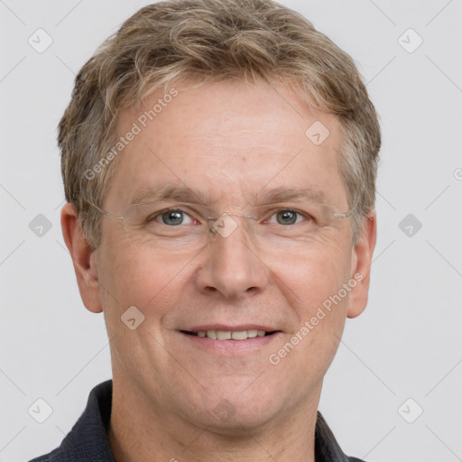 Joyful white adult male with short  brown hair and grey eyes