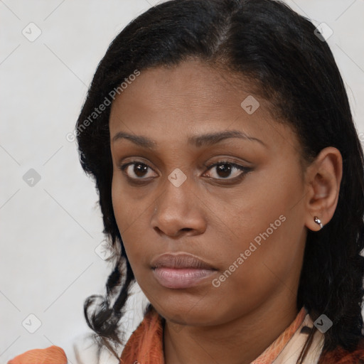 Neutral black young-adult female with medium  brown hair and brown eyes