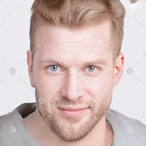 Joyful white young-adult male with short  brown hair and blue eyes