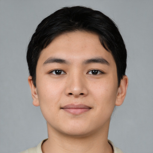 Joyful asian young-adult male with short  black hair and brown eyes