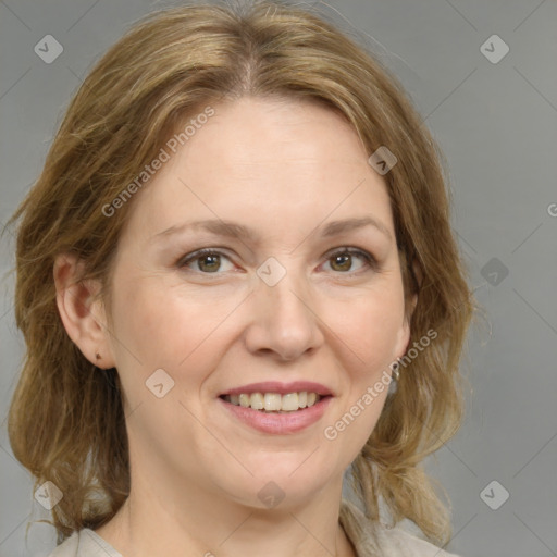 Joyful white adult female with medium  brown hair and grey eyes