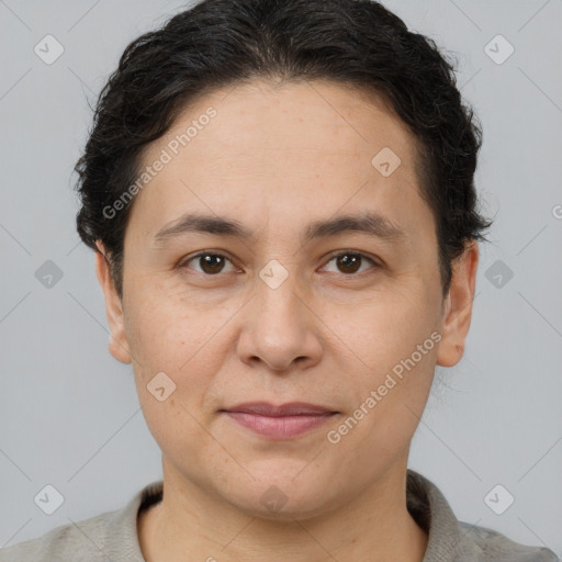 Joyful white adult female with short  brown hair and brown eyes