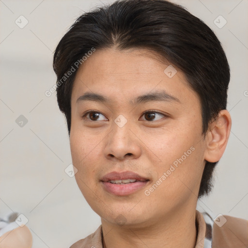 Joyful asian young-adult male with short  brown hair and brown eyes