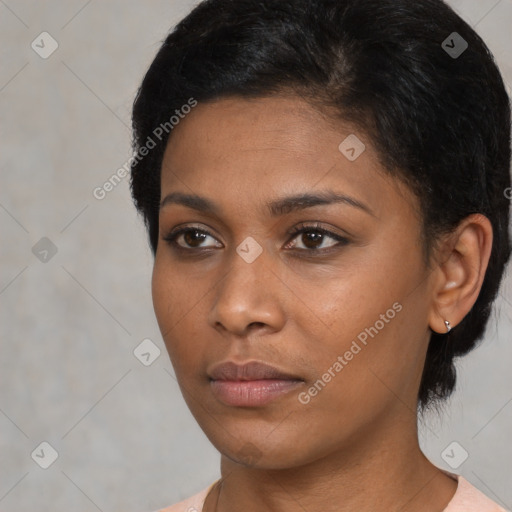 Neutral black young-adult female with short  black hair and brown eyes