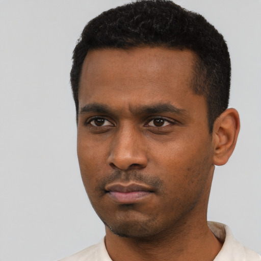 Neutral black young-adult male with short  black hair and brown eyes