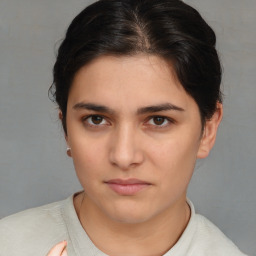 Neutral white young-adult female with short  brown hair and brown eyes