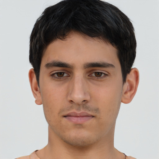 Neutral asian young-adult male with short  brown hair and brown eyes