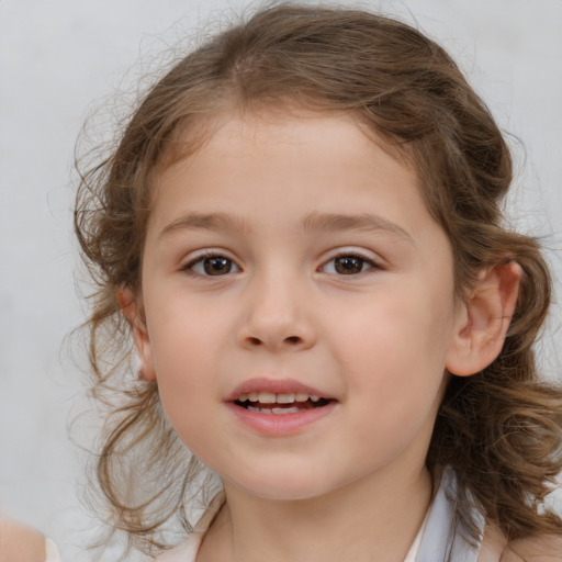 Joyful white child female with medium  brown hair and brown eyes