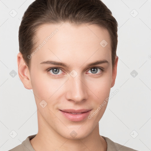 Joyful white young-adult female with short  brown hair and grey eyes