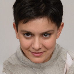 Joyful white child female with short  brown hair and brown eyes