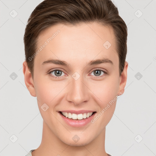 Joyful white young-adult female with short  brown hair and grey eyes