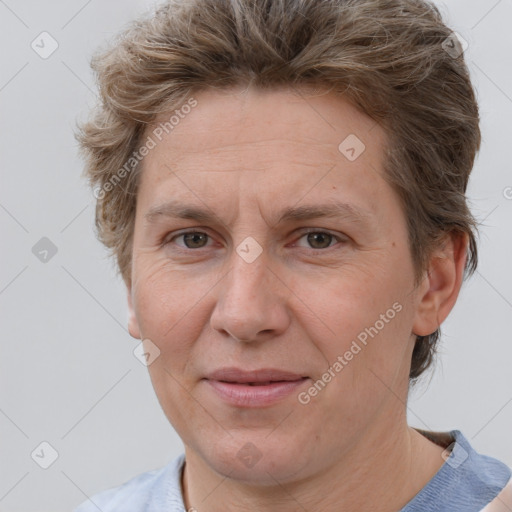 Joyful white adult female with short  brown hair and brown eyes