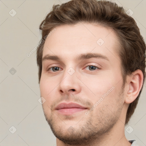 Neutral white young-adult male with short  brown hair and brown eyes