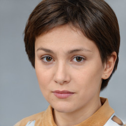 Neutral white young-adult female with medium  brown hair and brown eyes