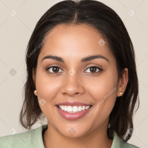 Joyful white young-adult female with medium  brown hair and brown eyes