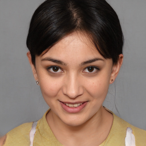 Joyful white young-adult female with medium  brown hair and brown eyes