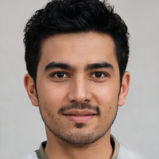 Neutral latino young-adult male with short  black hair and brown eyes
